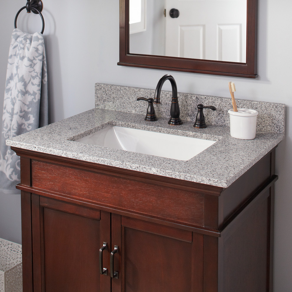 Design ideas for a small contemporary 3/4 bathroom in New York with open cabinets and granite benchtops.