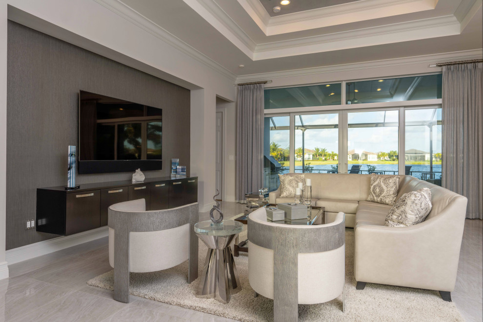 Inspiration for a large traditional open plan living room in Miami with grey walls, marble flooring, a wall mounted tv, beige floors, a coffered ceiling and wallpapered walls.
