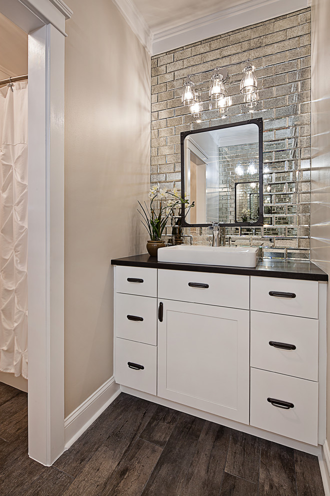 Inspiration for a small transitional kids bathroom in Charlotte with shaker cabinets, white cabinets, an alcove tub, an alcove shower, multi-coloured tile, mirror tile, beige walls, porcelain floors, a drop-in sink, granite benchtops, grey floor and a shower curtain.