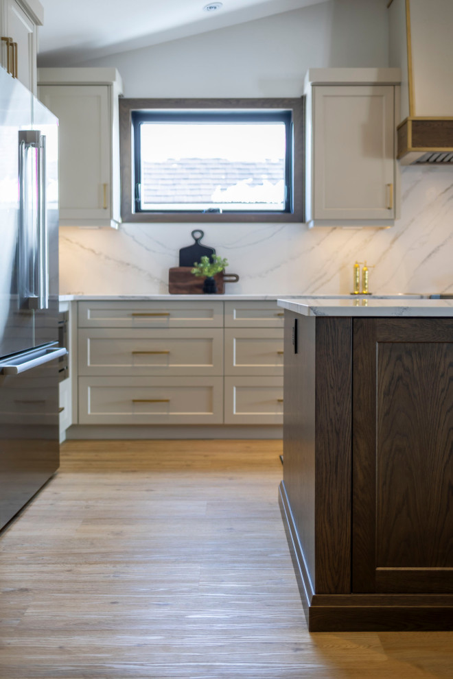 Example of a transitional kitchen design in Toronto