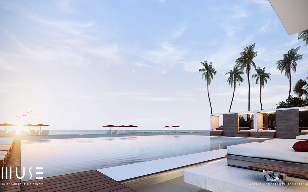 Photo of a large modern rectangular infinity pool in Miami.