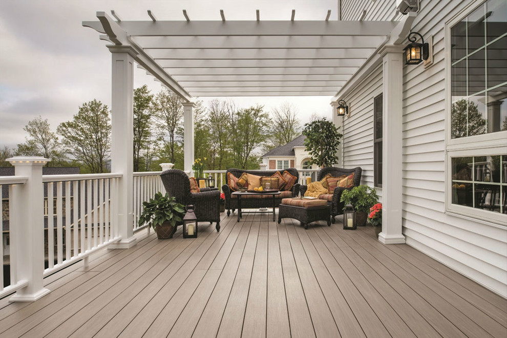 Inspiration for a mid-sized transitional backyard deck remodel in Boston with no cover