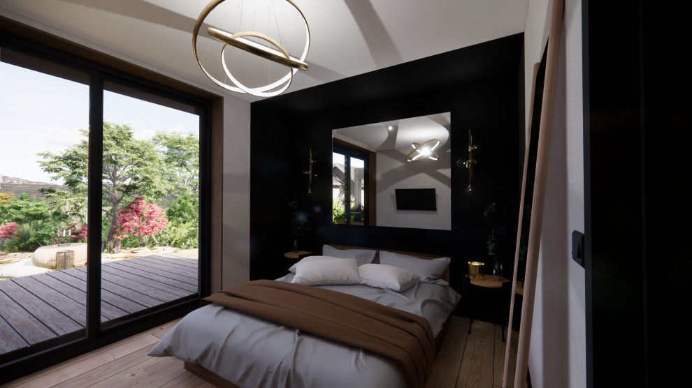 This is an example of a mid-sized contemporary bedroom in Dijon with black walls, plywood floors, no fireplace and beige floor.