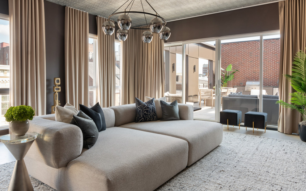 Inspiration for a large transitional home theater remodel in Philadelphia with brown walls and a wall-mounted tv