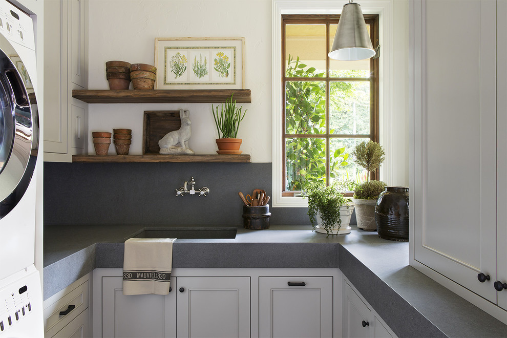 Design ideas for a transitional laundry room in Portland with grey benchtop.