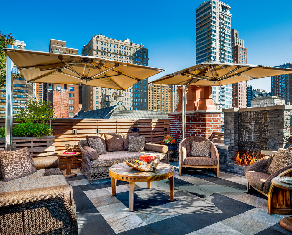 Photo of a large traditional rooftop and rooftop deck in Philadelphia with a fire feature.