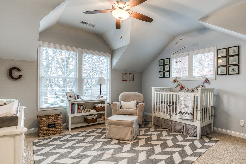Mid-sized traditional gender-neutral nursery in Kansas City with grey walls and carpet.