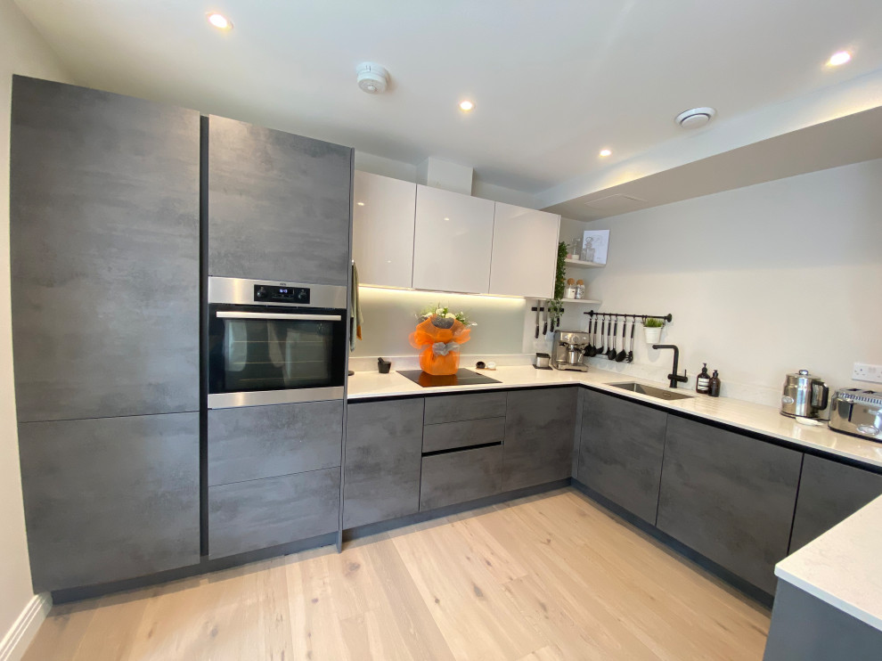 Design ideas for a modern kitchen in Surrey.