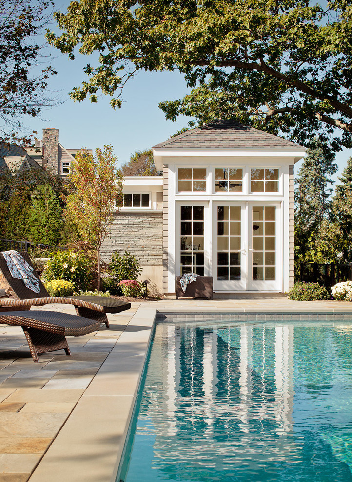 This is an example of a transitional rectangular pool in Portland Maine with a pool house.