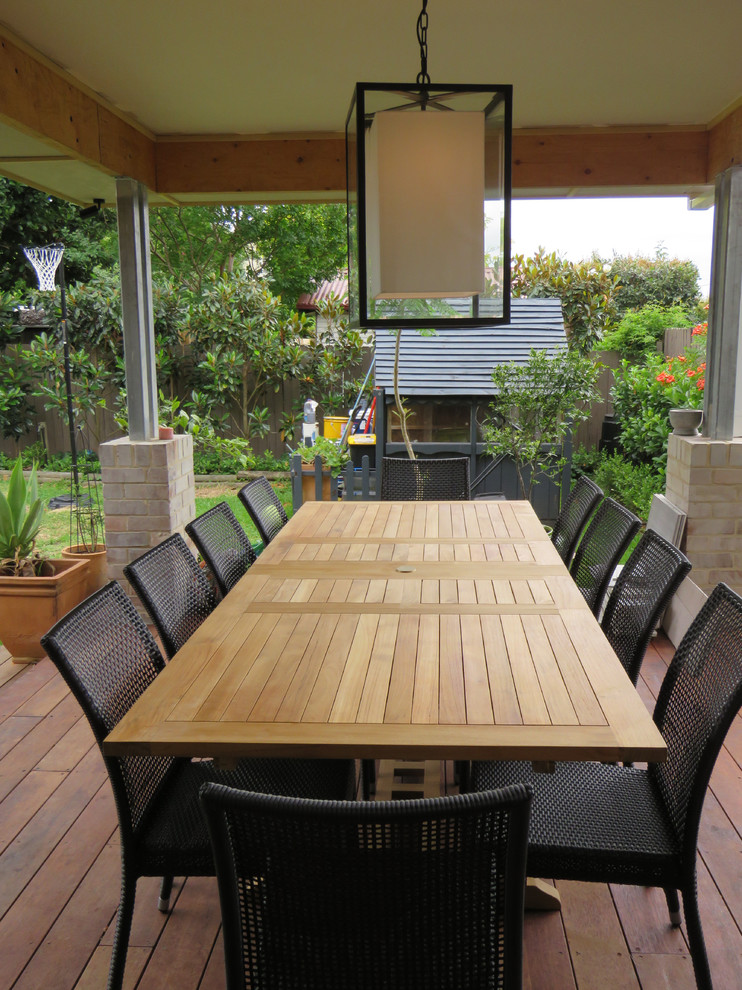 Large contemporary backyard verandah in Sydney with decking.