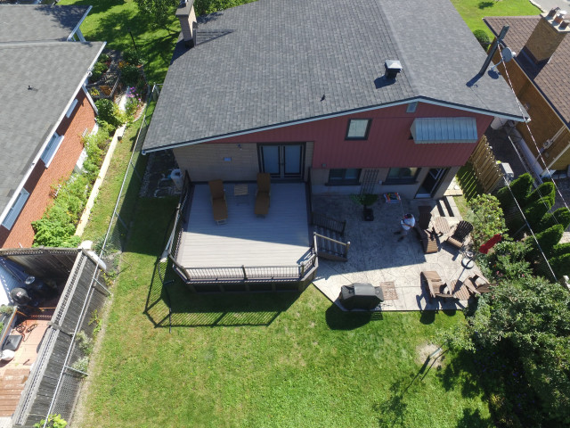 Azek PVC decking- Coastline & Dark Hickory with IRX railing and black lattice terrace