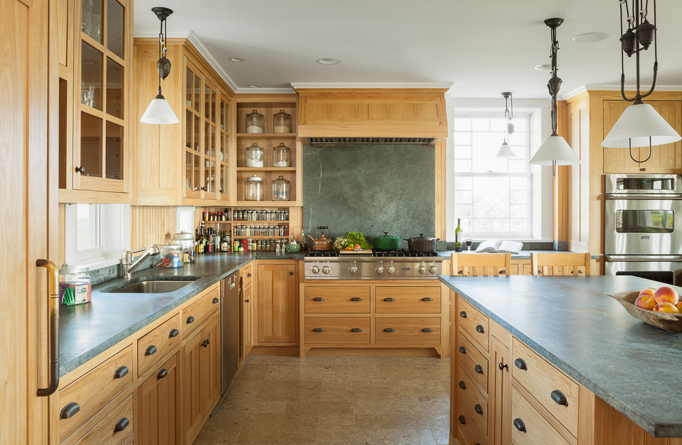 Design ideas for a traditional l-shaped separate kitchen in Portland Maine with an undermount sink, medium wood cabinets, stone slab splashback, stainless steel appliances, green splashback, shaker cabinets and soapstone benchtops.