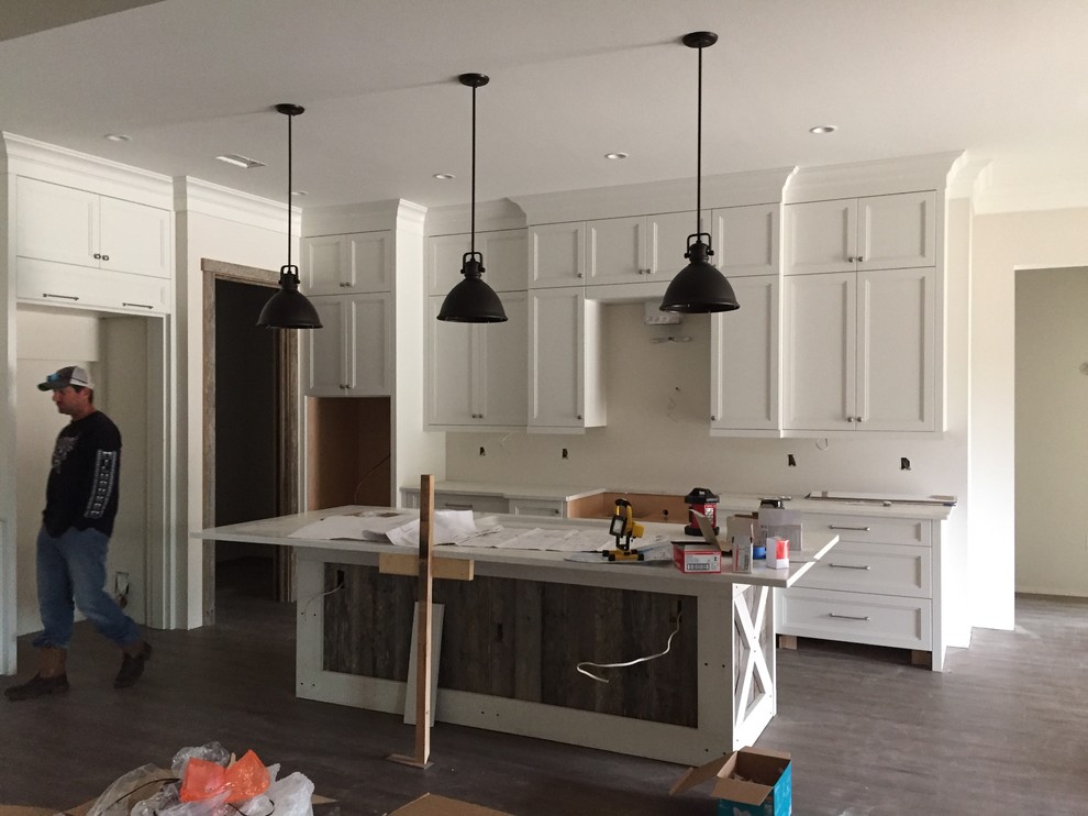 How high should pendants hang over a counter high kitchen island?
