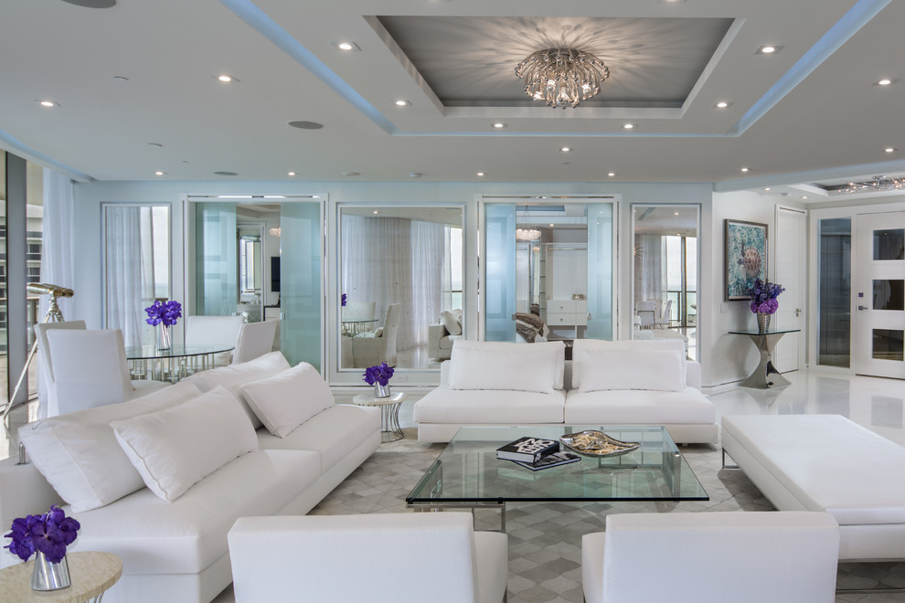 Inspiration for a large contemporary formal open concept living room in Miami with white walls, marble floors, no tv, a ribbon fireplace, a stone fireplace surround and white floor.
