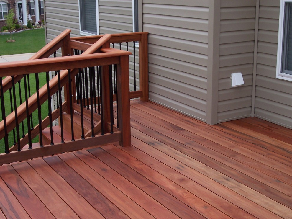 Photo of a mid-sized backyard deck in St Louis with no cover.