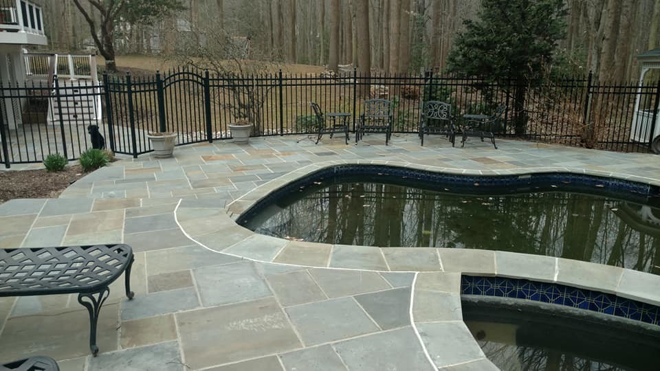 Pool - huge transitional backyard stone and kidney-shaped natural pool idea