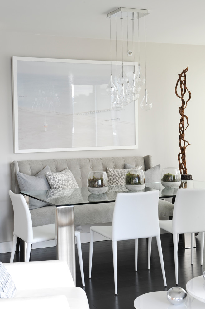 Contemporary dining room in Vancouver with grey walls and black floor.