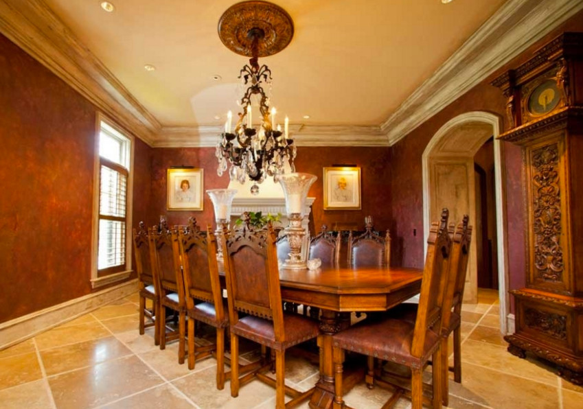 Mid-sized traditional separate dining room in Other with red walls, ceramic floors, no fireplace and beige floor.