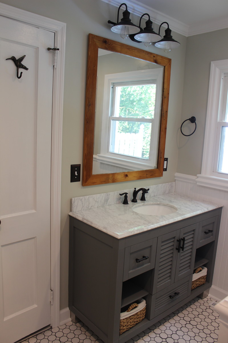 Example of a transitional bathroom design in Raleigh
