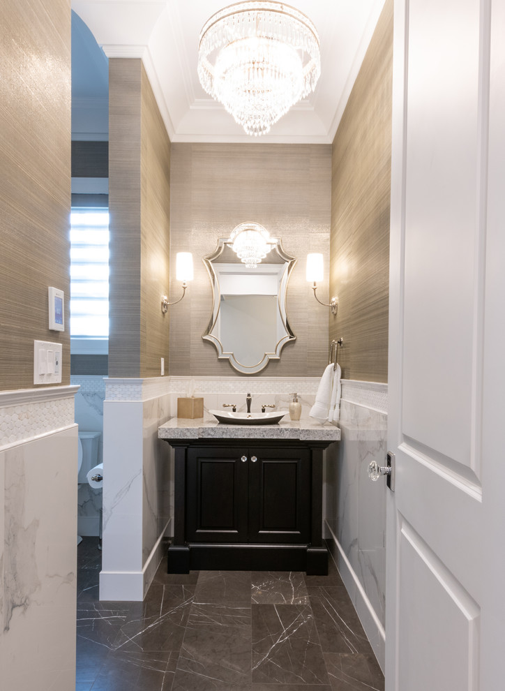 Design ideas for a transitional powder room in Edmonton with recessed-panel cabinets, brown cabinets, beige walls, ceramic floors, a vessel sink, granite benchtops, brown floor, grey benchtops, a freestanding vanity and panelled walls.