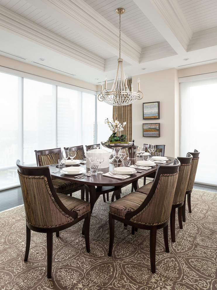 Inspiration for a transitional dining room in Toronto with beige walls.