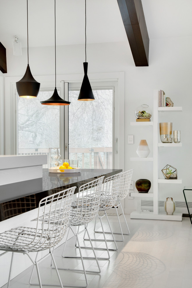 Open concept kitchen - mid-sized modern galley light wood floor and white floor open concept kitchen idea with an undermount sink, flat-panel cabinets, white cabinets, quartz countertops, window backsplash, white appliances and an island