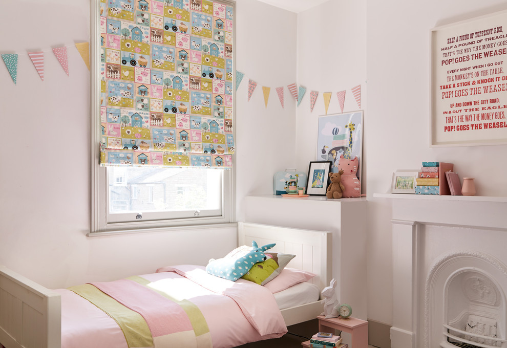 Inspiration for a transitional kids' bedroom for kids 4-10 years old and girls in Other with white walls.
