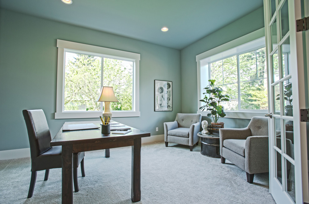 Photo of a large transitional study room in Seattle with grey walls, carpet and a freestanding desk.
