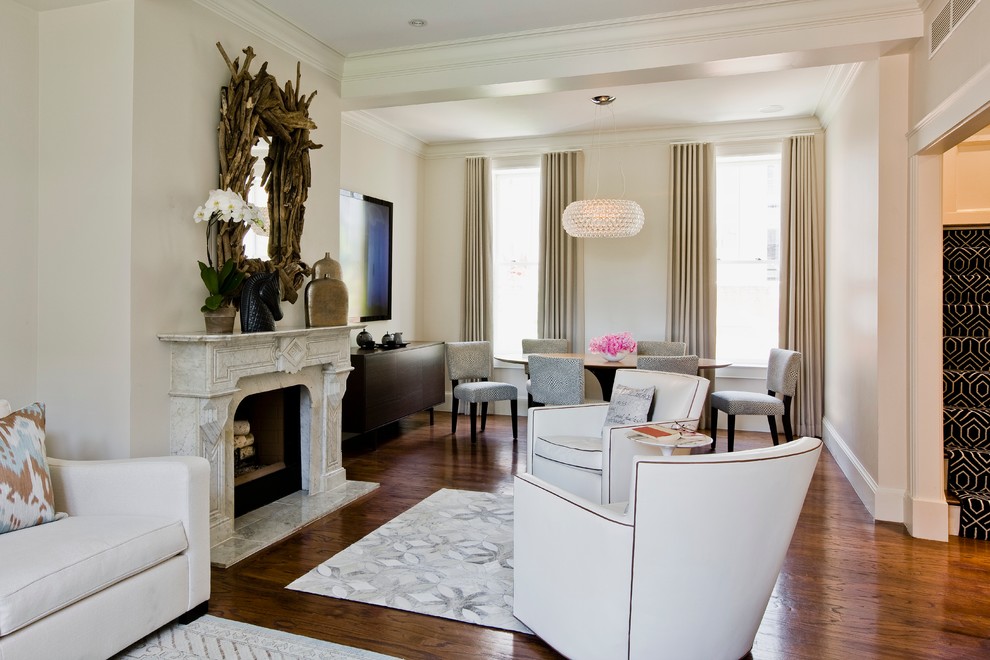 Photo of a transitional living room in Boston with white walls.