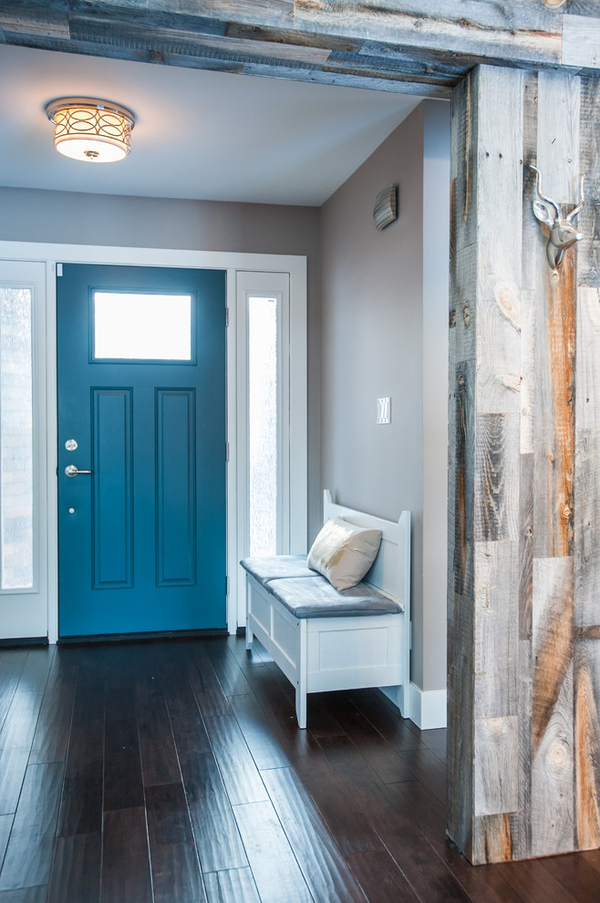 Mountain style entryway photo in Edmonton