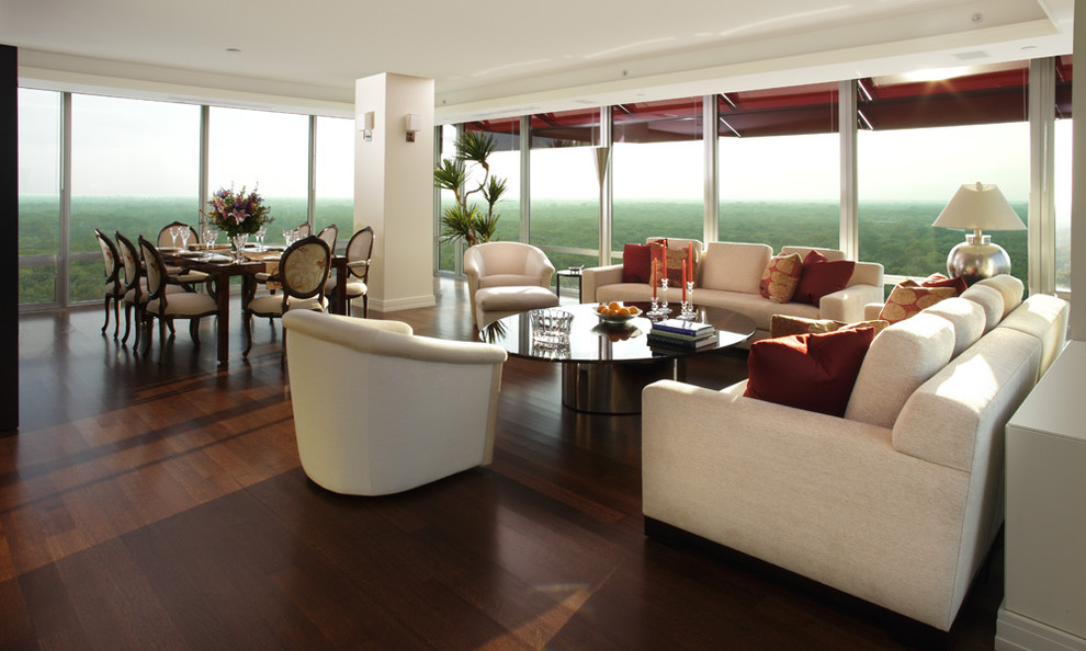 Modern open concept living room in Chicago with dark hardwood floors.