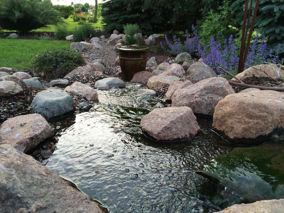 Design ideas for a large rustic shade backyard gravel pond for spring.