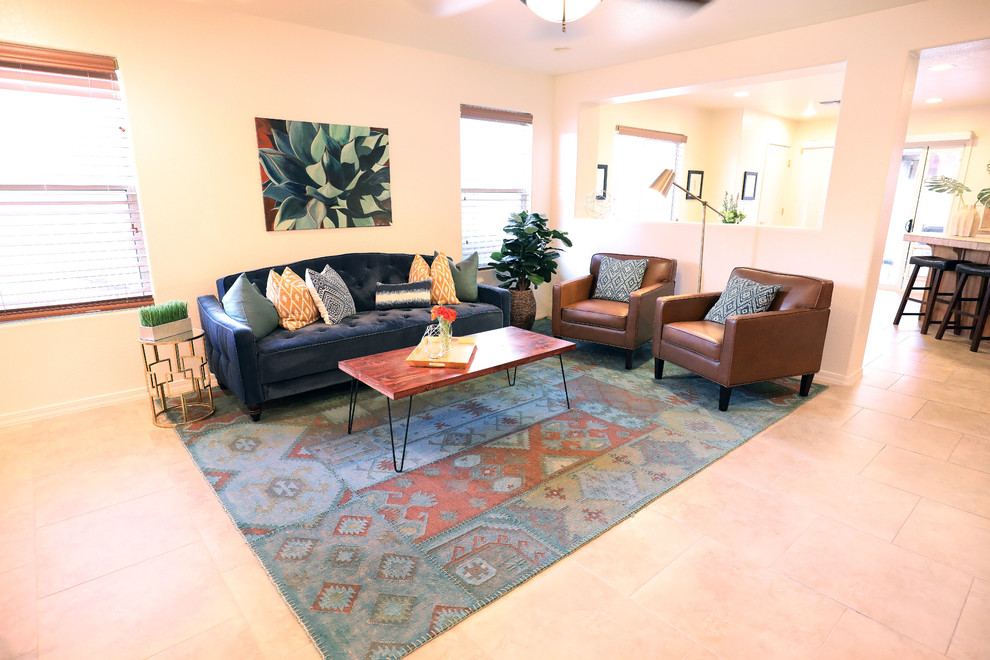 Example of a transitional home design design in Phoenix