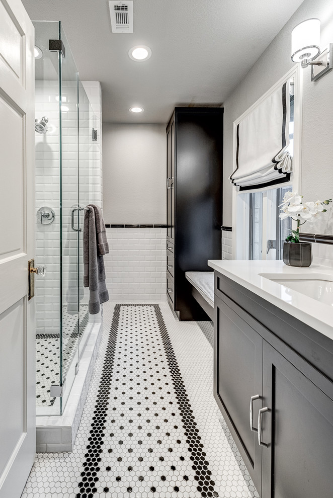 Country bathroom in Dallas with shaker cabinets, black cabinets, white tile, subway tile, mosaic tile floors, an undermount sink, engineered quartz benchtops and white benchtops.