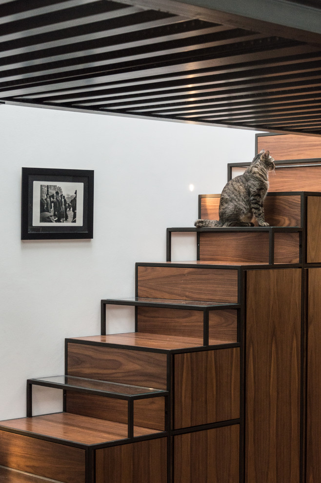 Mid-sized industrial wood straight staircase in Turin with wood risers.