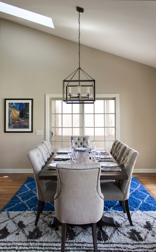 This is an example of a transitional dining room in Columbus.