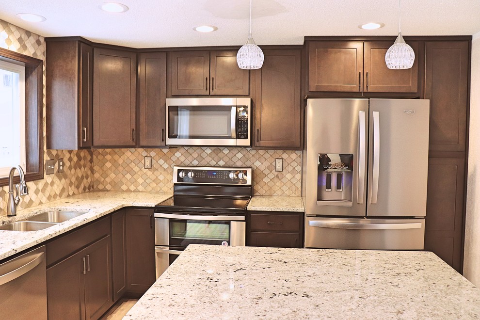 Example of a transitional kitchen design in Cedar Rapids