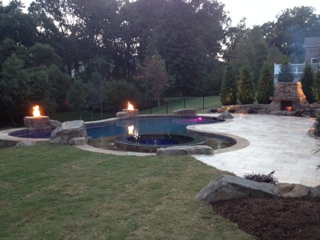 Example of a mountain style home design design in Charlotte