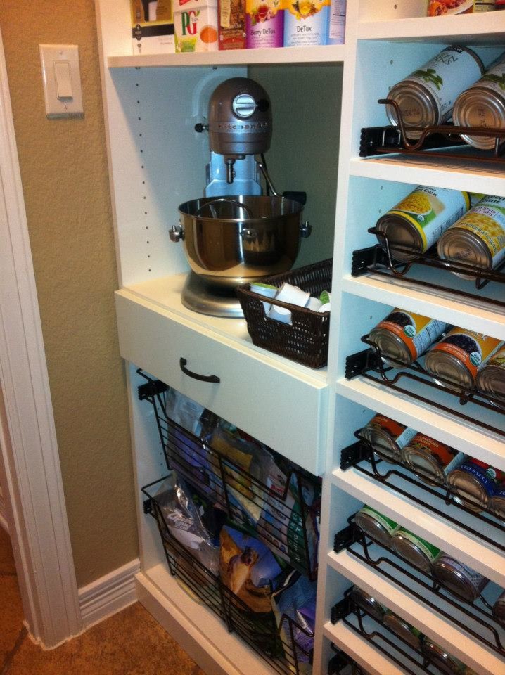 Transitional kitchen pantry photo in Austin