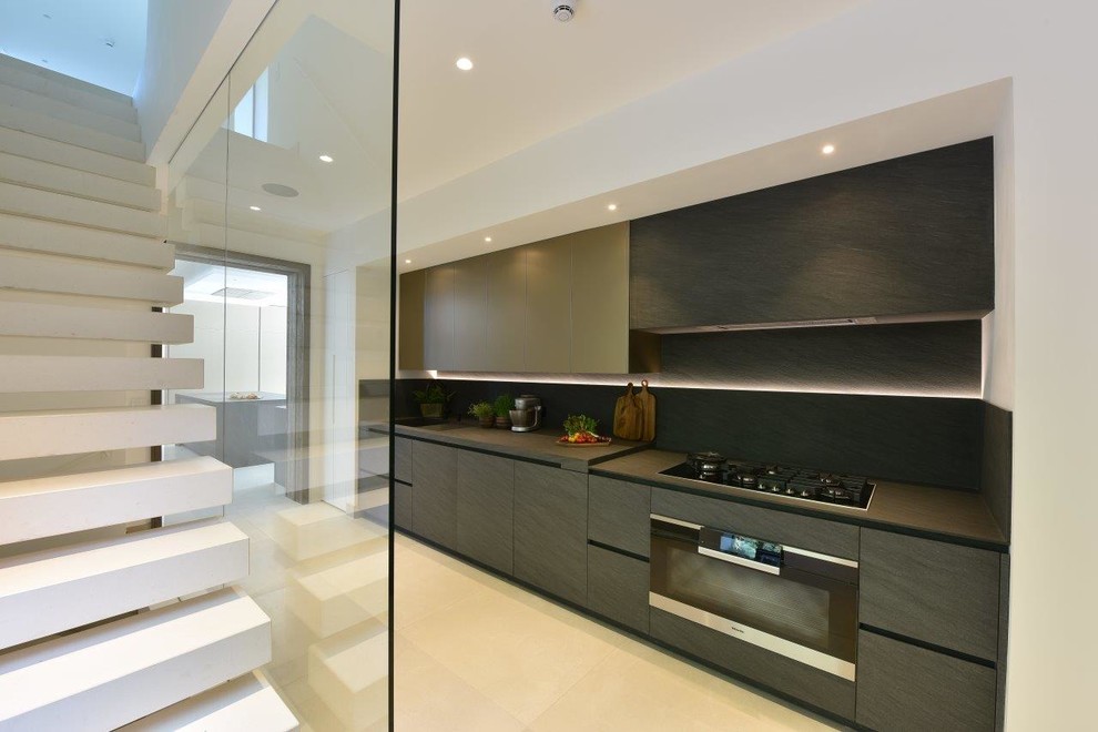 Design ideas for a large contemporary kitchen in Cheshire with a drop-in sink, granite benchtops, grey splashback, stone slab splashback, coloured appliances, porcelain floors, with island, beige floor and grey benchtop.