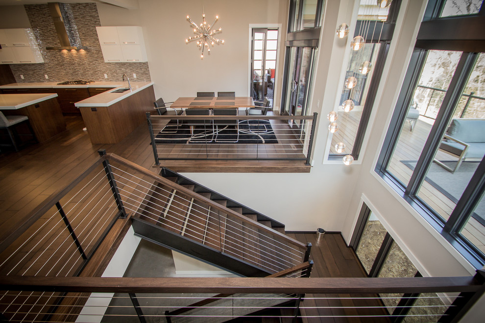 Large contemporary wood floating staircase in Minneapolis.