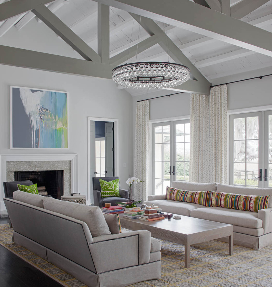 Photo of a transitional formal living room in Atlanta with grey walls and a standard fireplace.