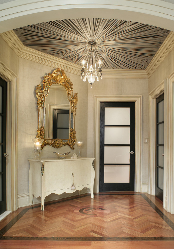Design ideas for a traditional hallway in New York with beige walls and medium hardwood floors.