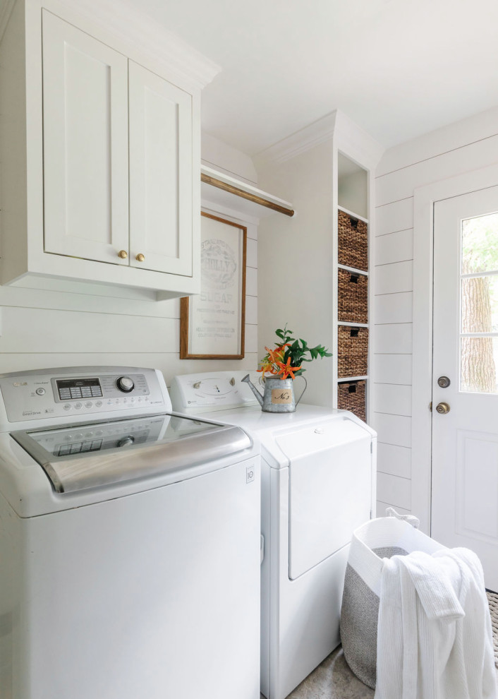 This is an example of a beach style laundry room in Houston.
