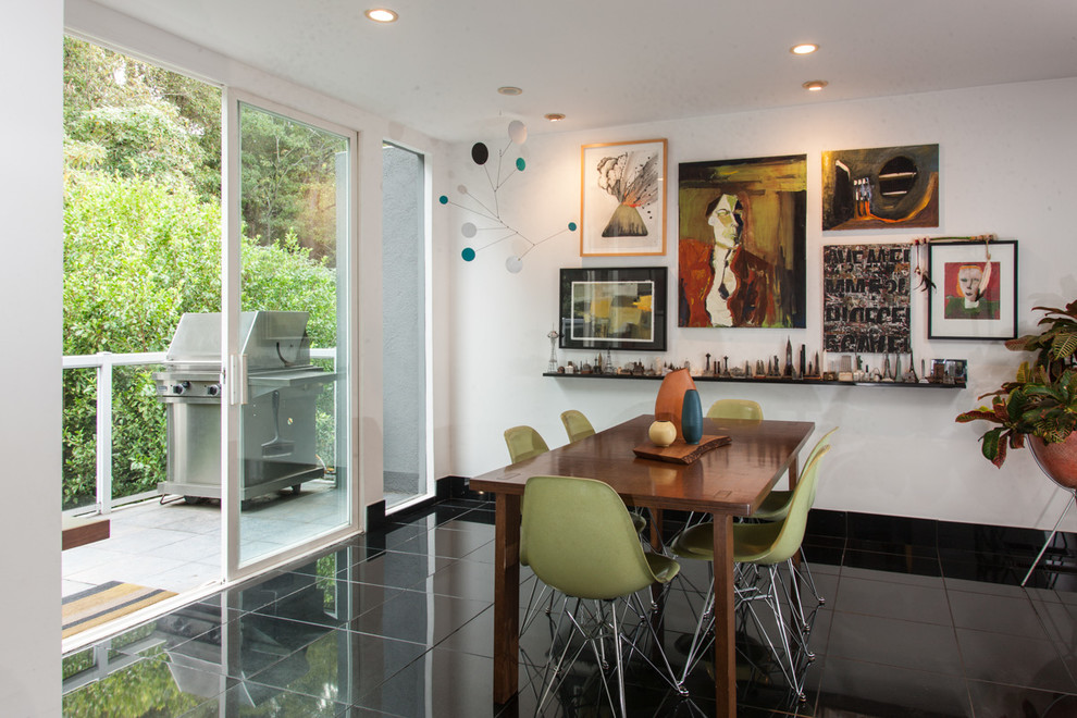 Inspiration for a contemporary dining room in Los Angeles with white walls.