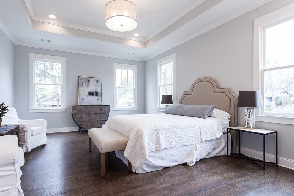 Design ideas for a country master bedroom in Atlanta with grey walls and dark hardwood floors.