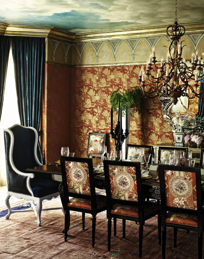 Inspiration for an eclectic dining room in Los Angeles with red walls.