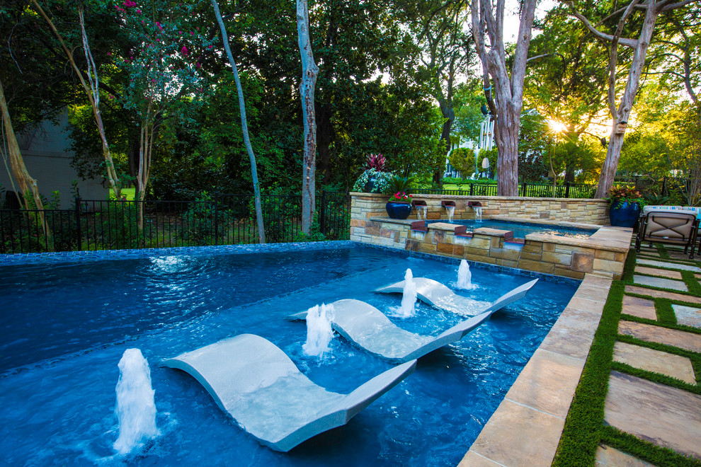 Design ideas for a contemporary pool in Dallas.
