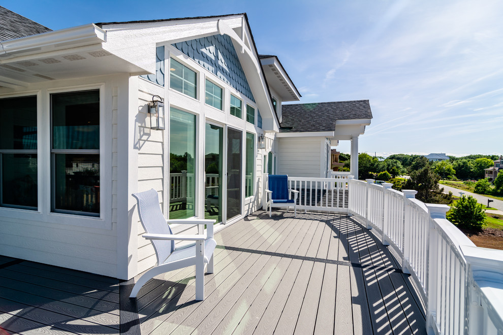 Deck - mid-sized coastal backyard deck idea with no cover