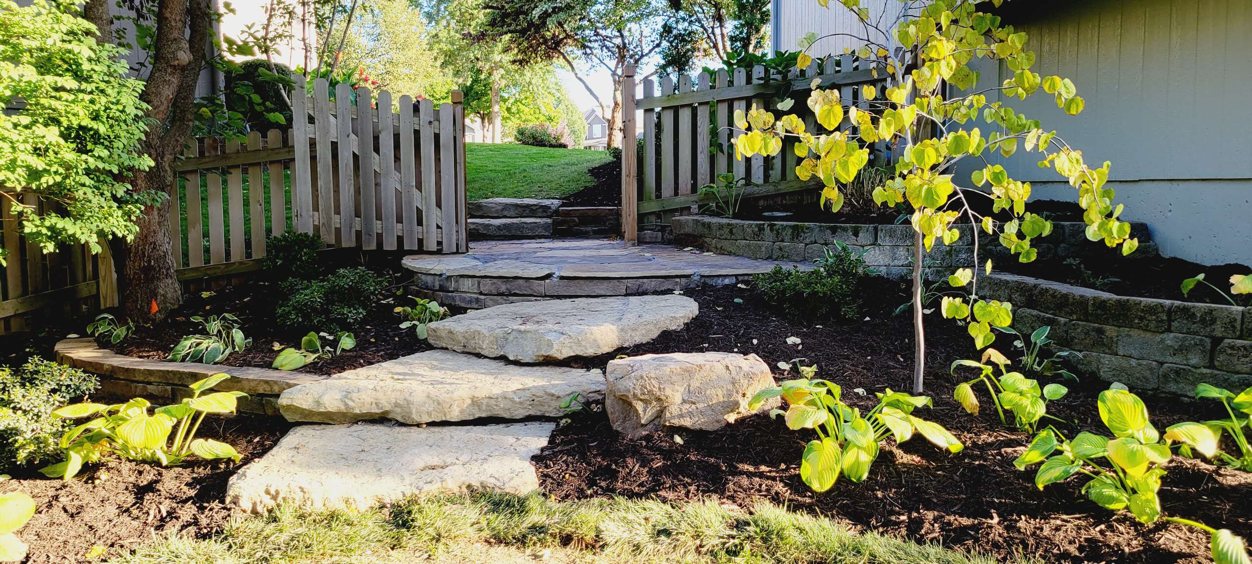 Hillside Gate Landing with Garden After
